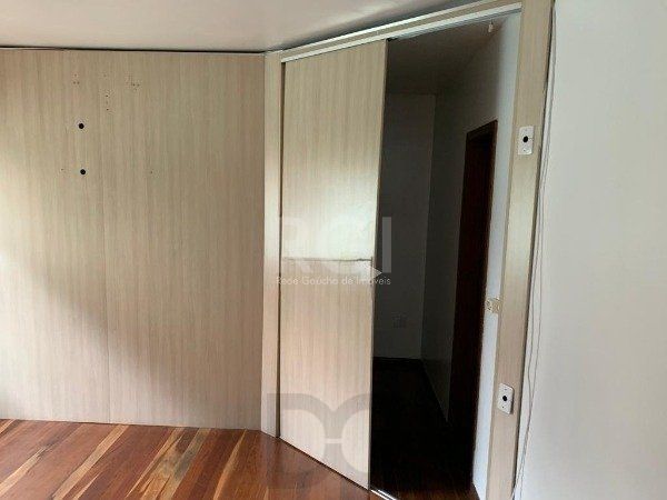Casa no bairro Jardim Botânico de 3 dormitórios — foto 4