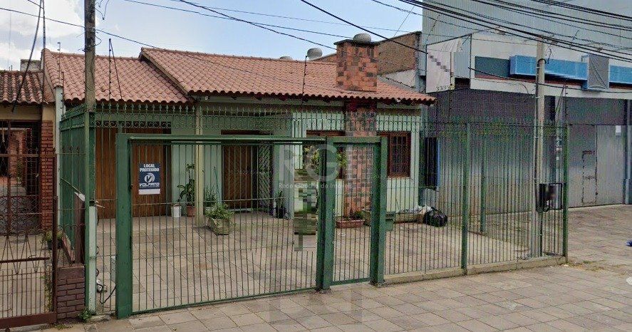 Casa no bairro Jardim Botânico de 3 dormitórios — foto 1