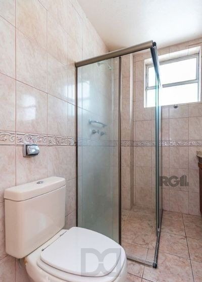 Apartamento no bairro Auxiliadora de 2 dormitórios dependência e vaga DESOCUPADO — foto 11