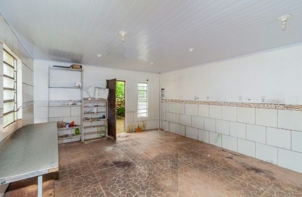 Casa / Terreno com 3 casas de alvenaria no bairro Morro Santana — foto 17