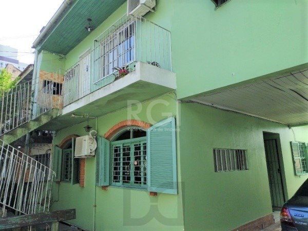 Casa sobrado no bairro Petrópolis de 4 dormitórios — foto 1
