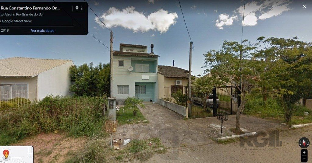 Casa, estilo sobrado, com 03 dormitórios (01suíte) e 02 vagas, no bairro Hípica, em Porto Alegre, RS. — foto 1