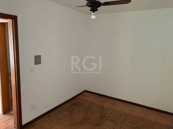 Casa no bairro Jardim Botânico de 3 dormitórios — foto 5
