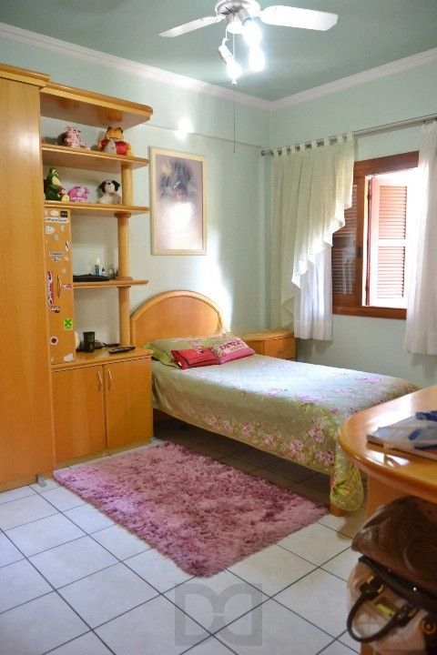 Casa Comercial e Residencial com 518m² (4 quartos / 5 banheiros / 3 vagas garagem) no Bairro Partenon localizada à meia quadra da Av. Bento Gonçalves. — foto 11