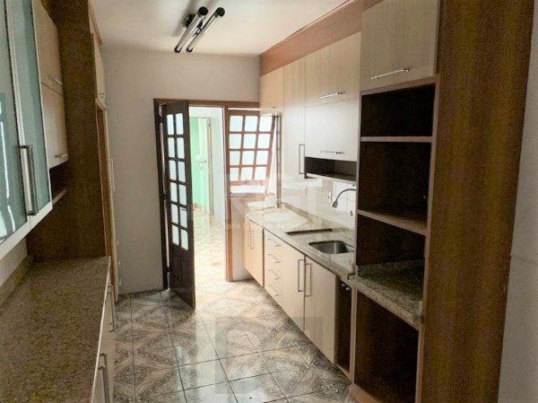 Casa no bairro Jardim Botânico de 3 dormitórios — foto 6