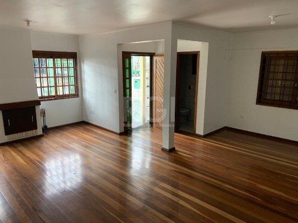 Casa no bairro Jardim Botânico de 3 dormitórios — foto 2