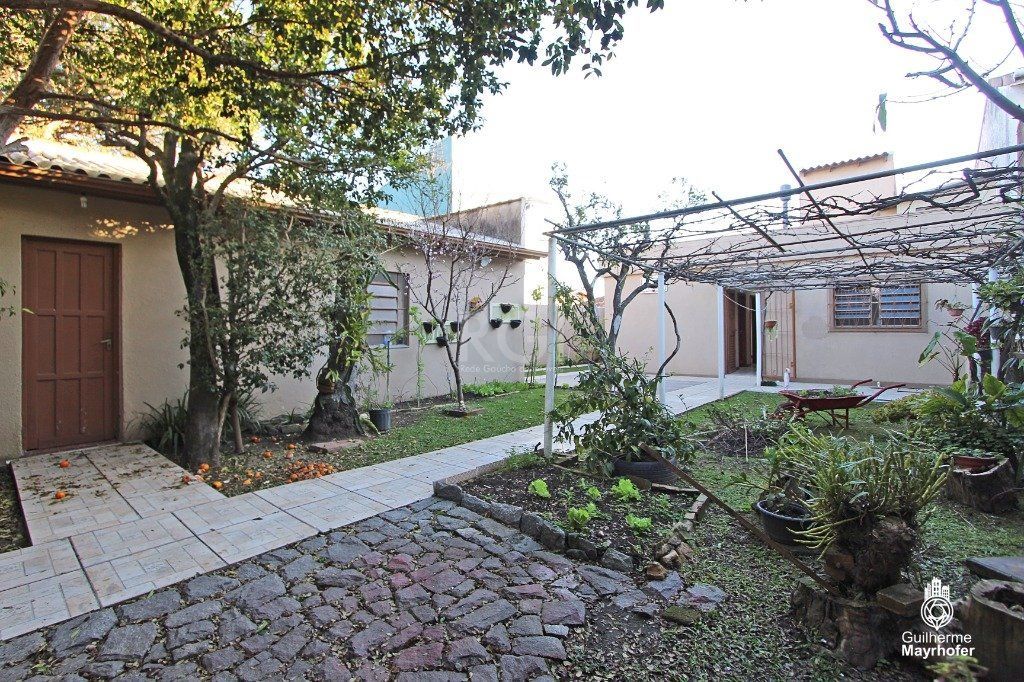 Casa no bairro Cavalhada de 3 dormitórios e amplo pátio — foto 25