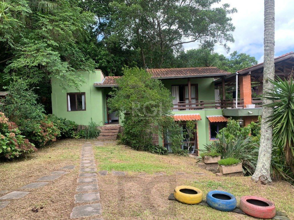 Terreno de 5.280 m², com 3 casas, no bairro Ponta Grossa, em Porto Alegre. — foto 1