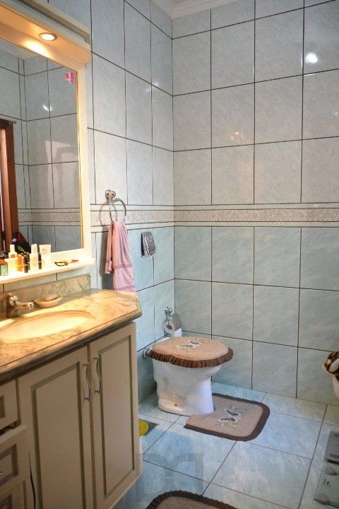 Casa Comercial e Residencial com 518m² (4 quartos / 5 banheiros / 3 vagas garagem) no Bairro Partenon localizada à meia quadra da Av. Bento Gonçalves. — foto 5