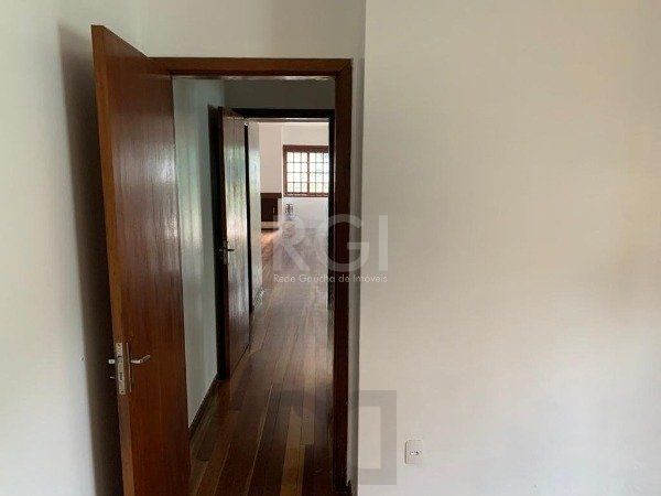 Casa no bairro Jardim Botânico de 3 dormitórios — foto 13
