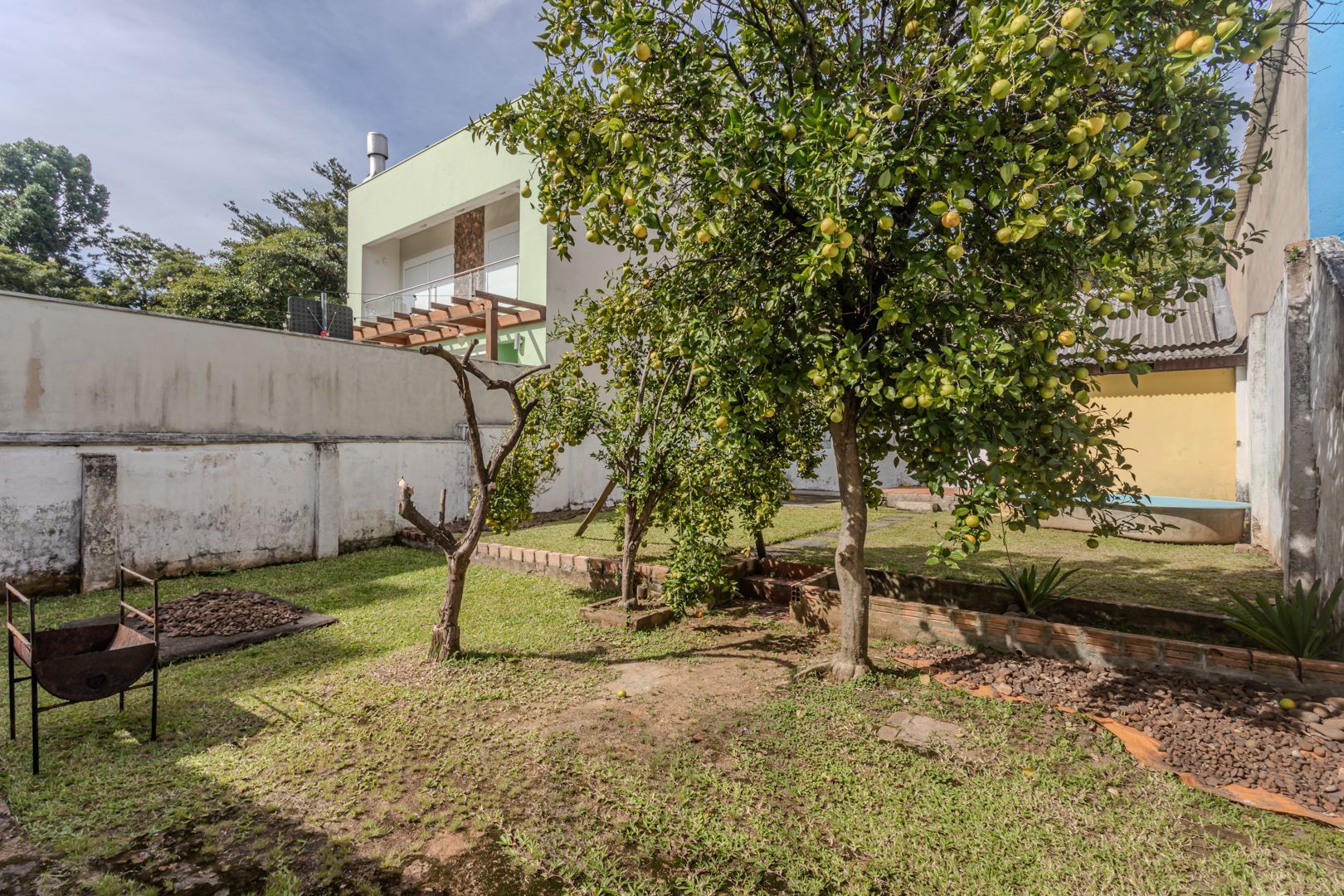Casa no bairro Jardim Botânico de 3 dormitórios e garagem e terreno com 370m² — foto 22