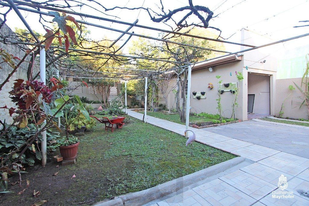 Casa no bairro Cavalhada de 3 dormitórios e amplo pátio — foto 24