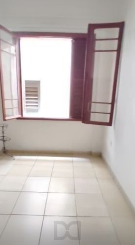 Apartamento no Centro de 3 dormitórios e dependência DESOCUPADO — foto 7