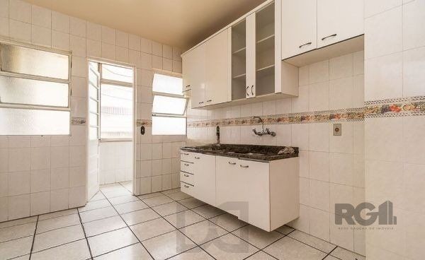 Apartamento no bairro Auxiliadora de 2 dormitórios dependência e vaga DESOCUPADO — foto 15