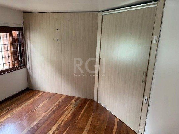 Casa no bairro Jardim Botânico de 3 dormitórios — foto 9