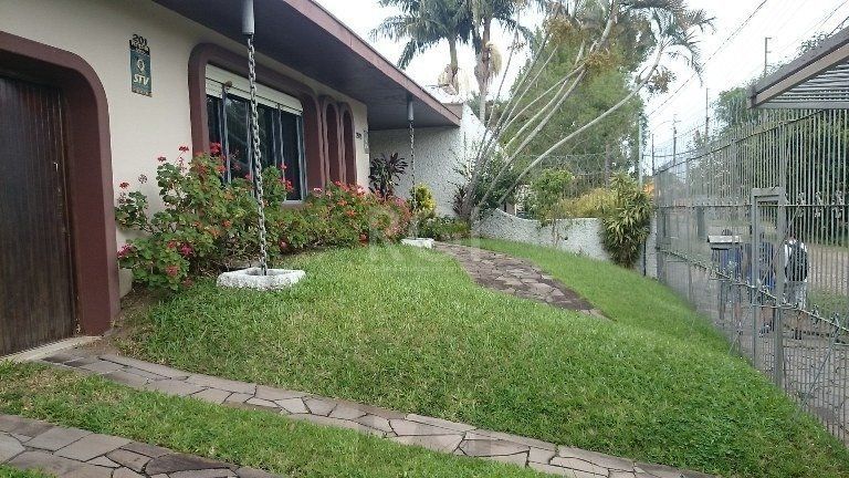 Casa com 4 dormitórios no Bairro Guarujá — foto 4