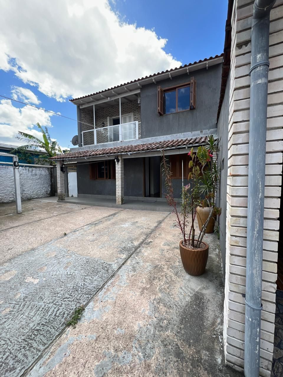 Ampla casa no Bairro Restinga 4 Dormitórios sendo um suíte — foto 2