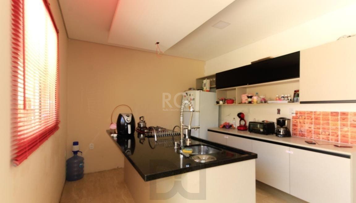 Casa no bairro Hípica - 3 dormitórios — foto 5