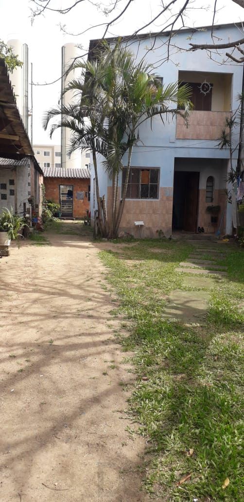 Terreno com 2 casas de Alvenaria — foto 1