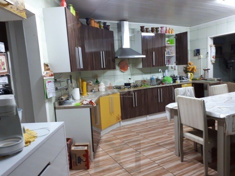 Casa com 4 dormitórios no bairro Vila Nova — foto 40