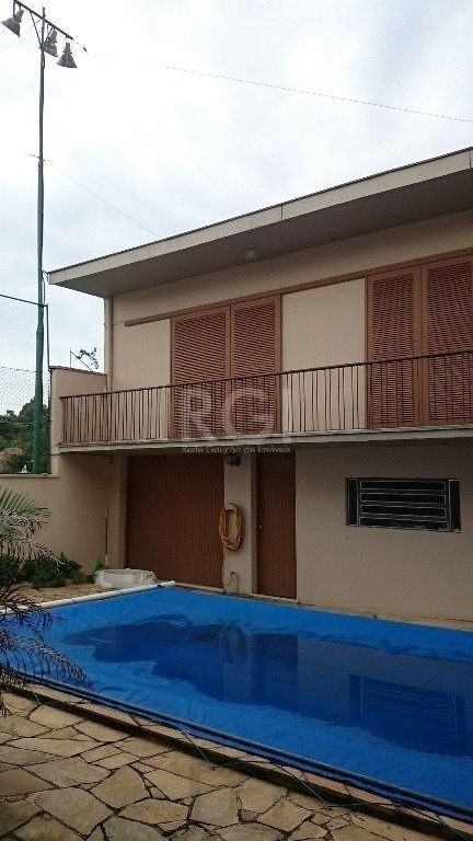 Casa com 4 dormitórios no Bairro Guarujá — foto 5