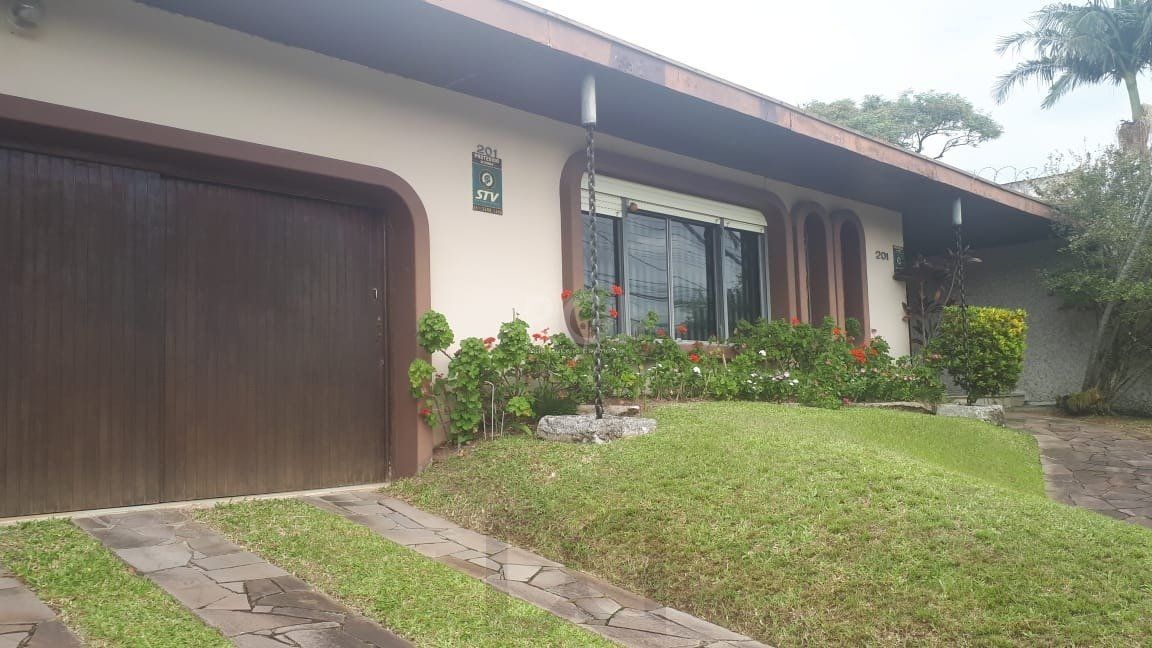 Casa com 4 dormitórios no Bairro Guarujá — foto 2