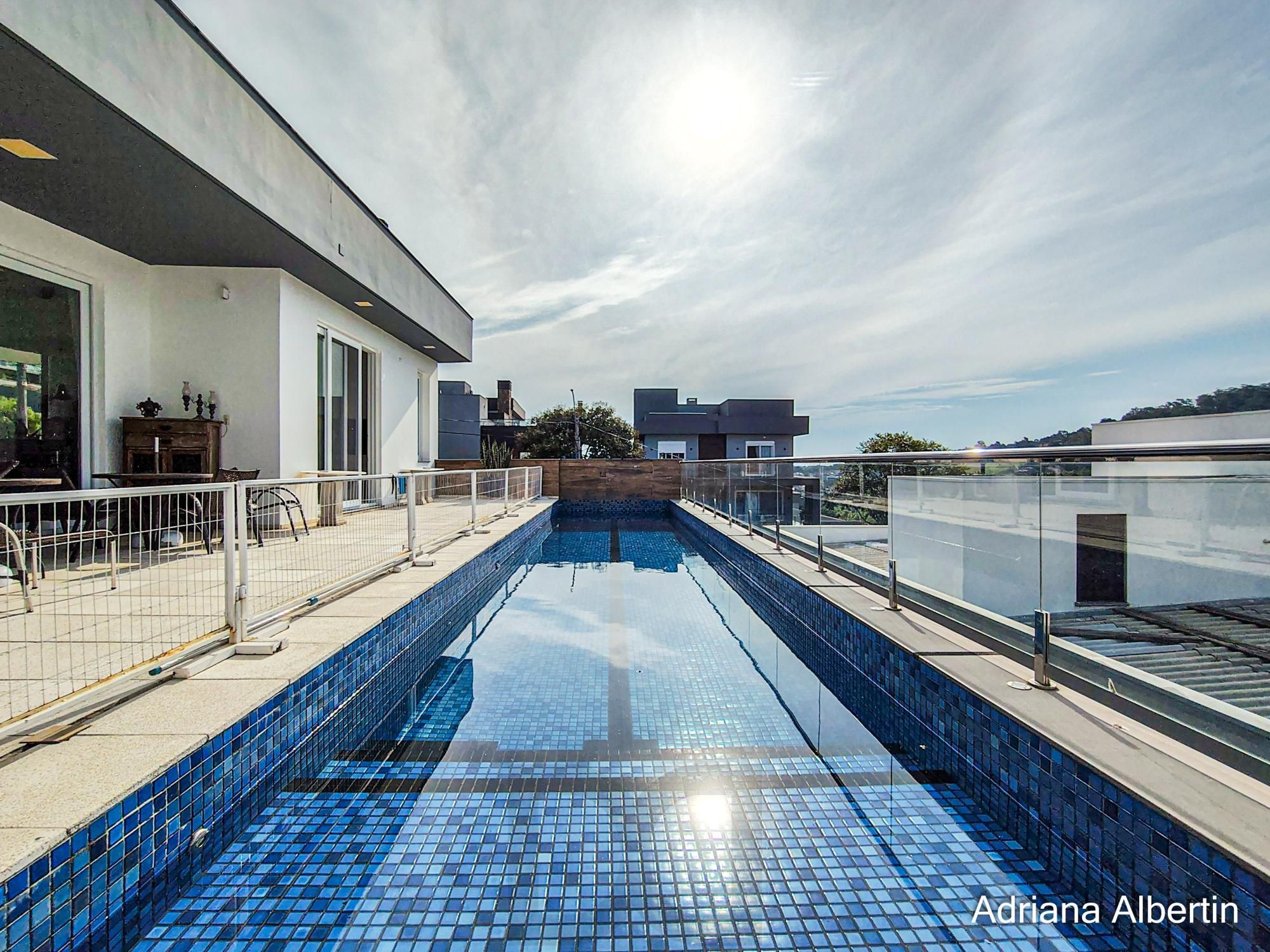 Casa com 660m² no Alphaville Porto Alegre para quem quer espaço, vista e personalidade — sem cair no padrão genérico — foto 1