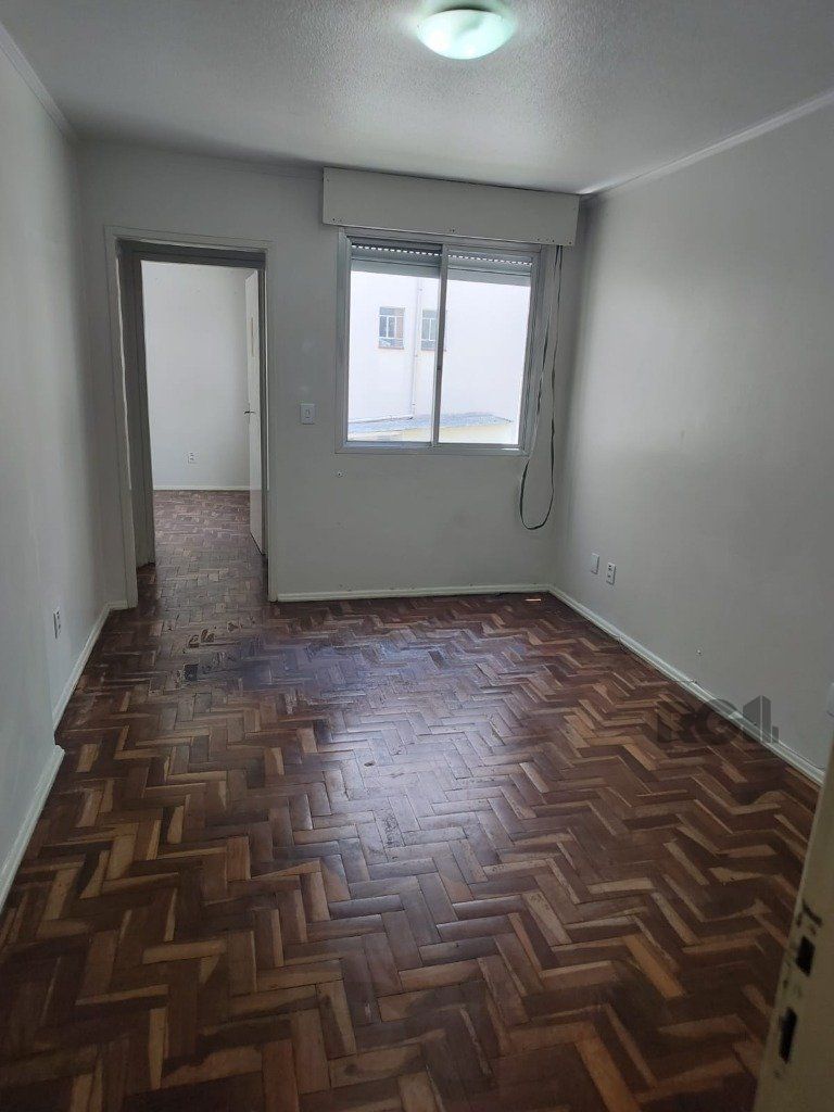 Apartamento 1Dormitório desocupado na Venâncio Aires piso parquêt ensolarado área de serviço ac financiamento FGTS — foto 2
