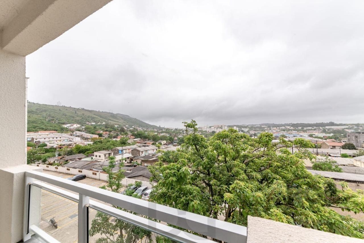 Apartamento 2 dormitórios e uma vaga no bairro morro santana com sacada. — foto 5
