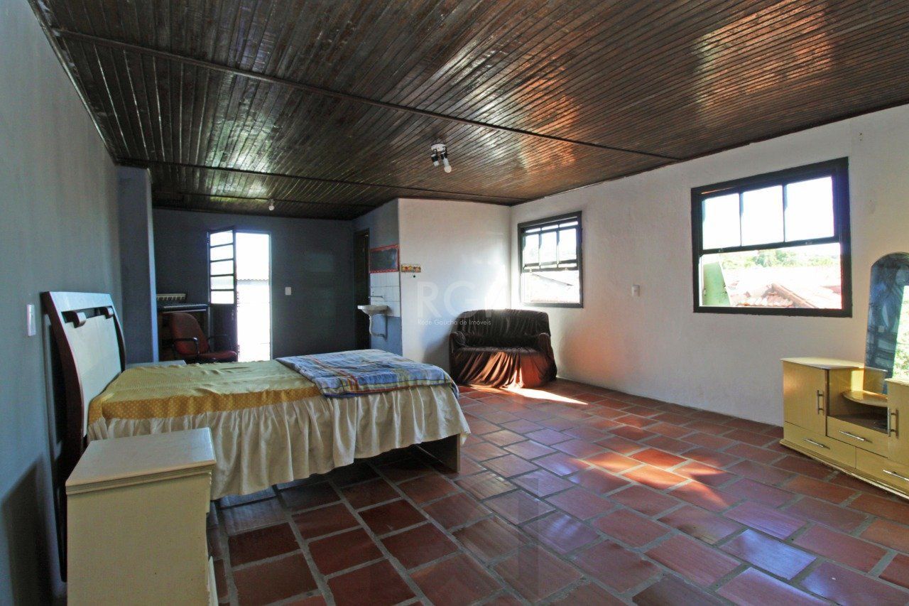 Casa 5 dormitórios, 1 suíte, 2 vagas de garagem, no bairro Camaquã, Poa/RS. — foto 28