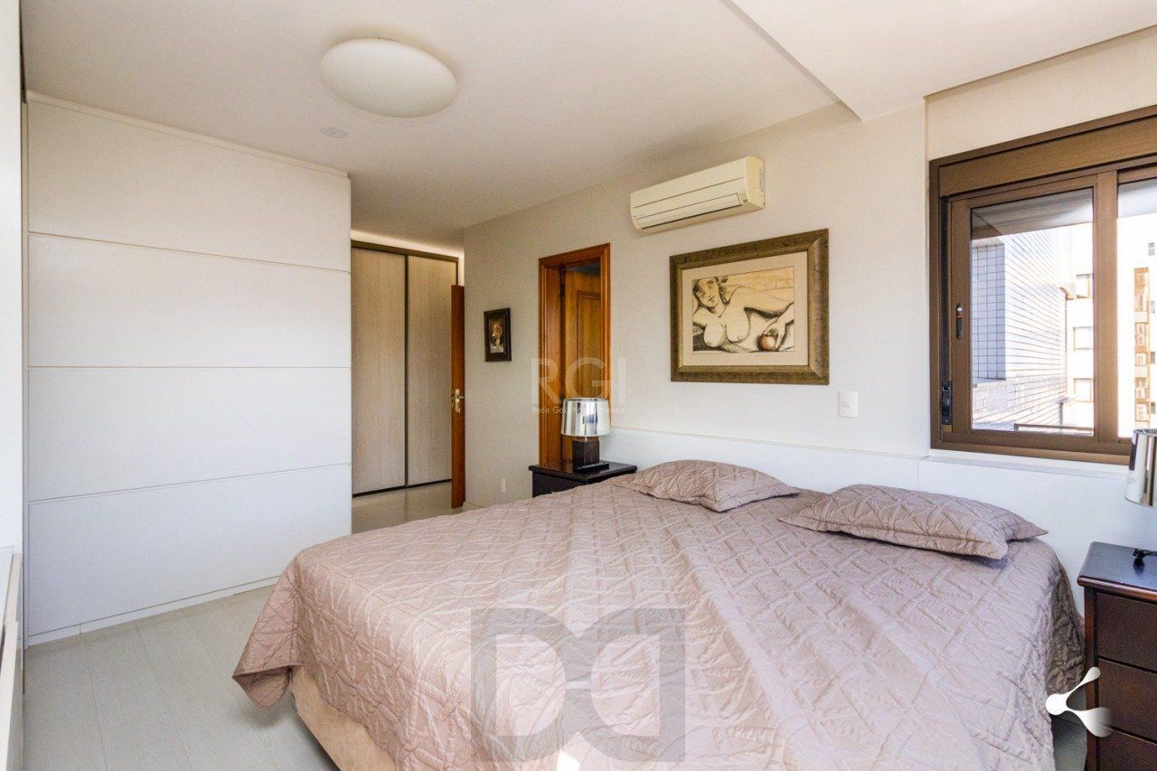 195m churrasqueira, 3 suites, 4 vagas semimobiliado no bairro Rio Branco, Poa/RS — foto 26