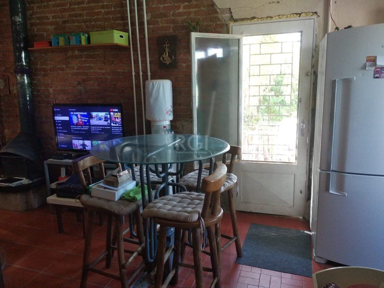 Casa 2 dormitórios, garagem coberta, terreno 621m² bairro Camaquã, Porto Alegre — foto 9