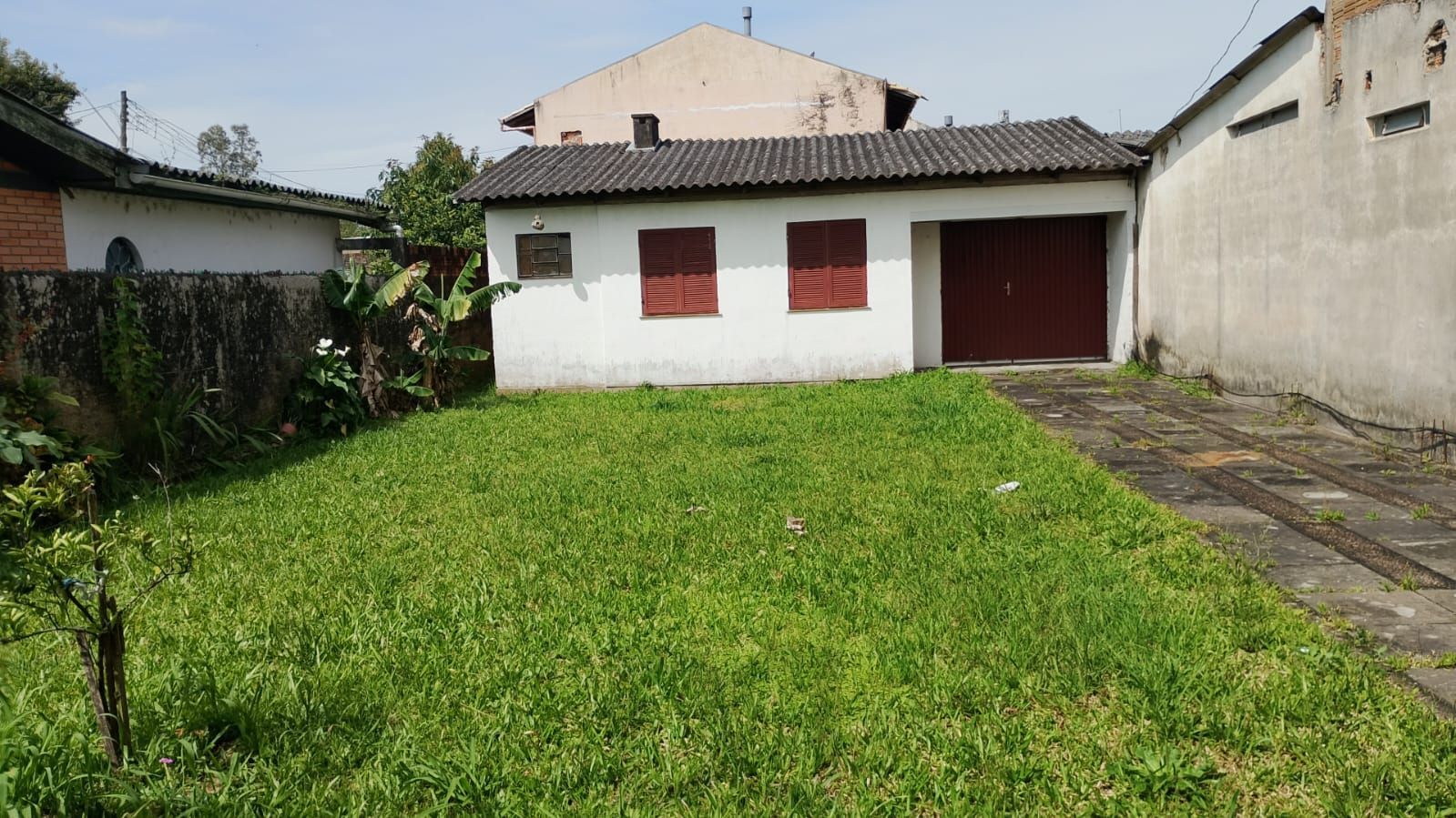 Casa térrea com 2 dormitórios na casa da frente e no fundos ,um galpão de alvenaria , churrasqueira ! — foto 16