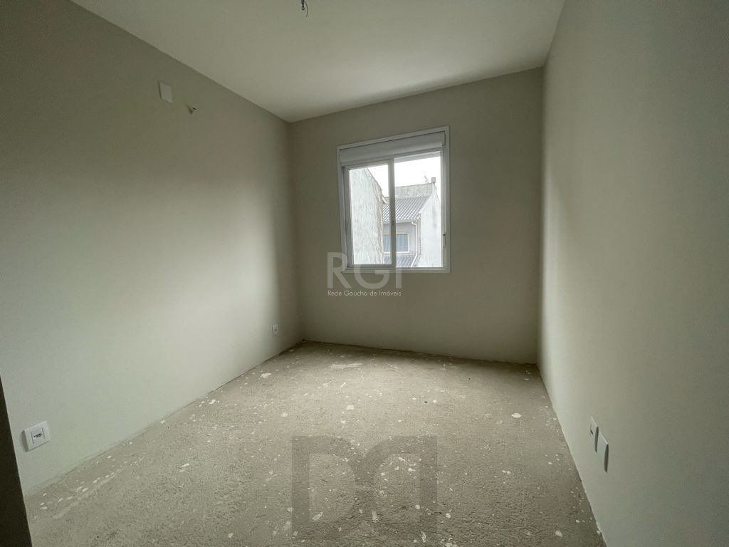 Casa 3 dormitórios, sendo 1 suites, 2 vagas - Guarujá, Porto Alegre RS — foto 9