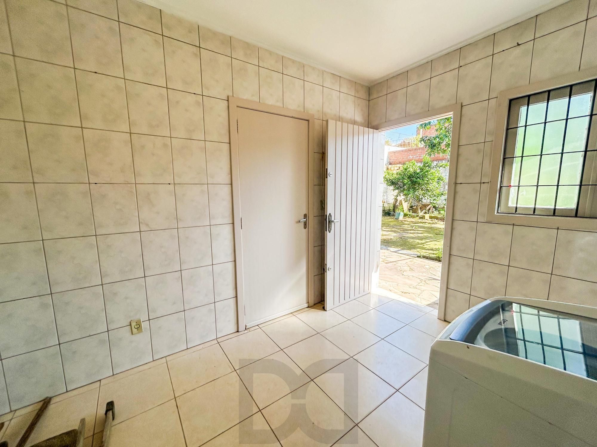 Casa 3 Dormitórios com Suíte à Venda na Vila Nova em Porto Alegre — foto 26