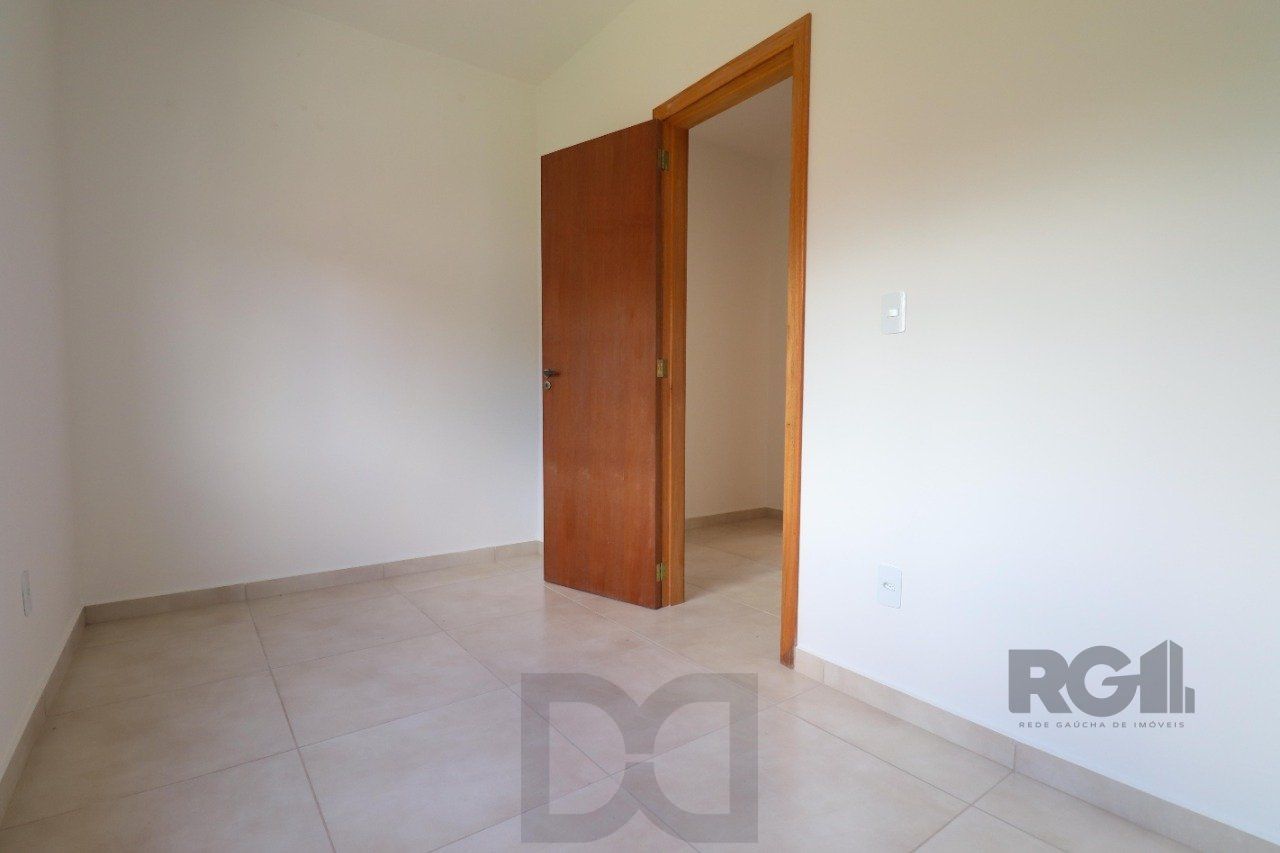 CASA ESTILO SOBRADO COM 2 QUARTOS E PÁTIO, À VENDA NO BAIRRO VILA NOVA, EM PORTO ALEGRE/RS — foto 24