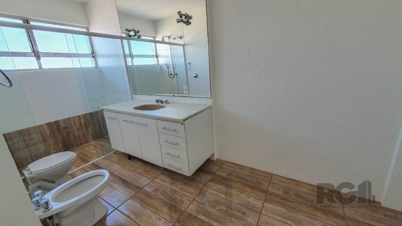 Apartamento com 4 quartos, vaga de garagem, no bairro Moinhos de Vento, Poa/RS — foto 3