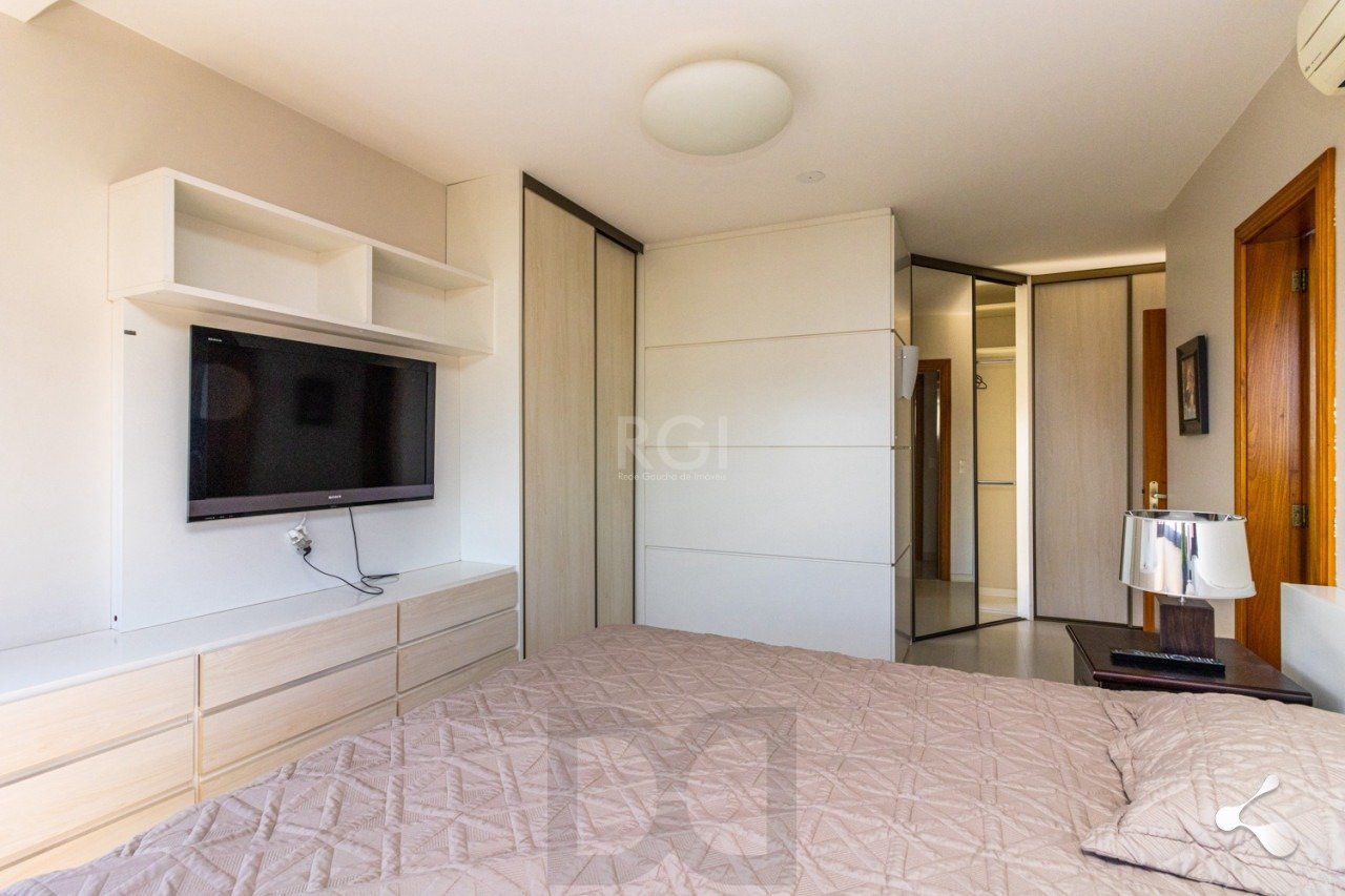 195m churrasqueira, 3 suites, 4 vagas semimobiliado no bairro Rio Branco, Poa/RS — foto 28