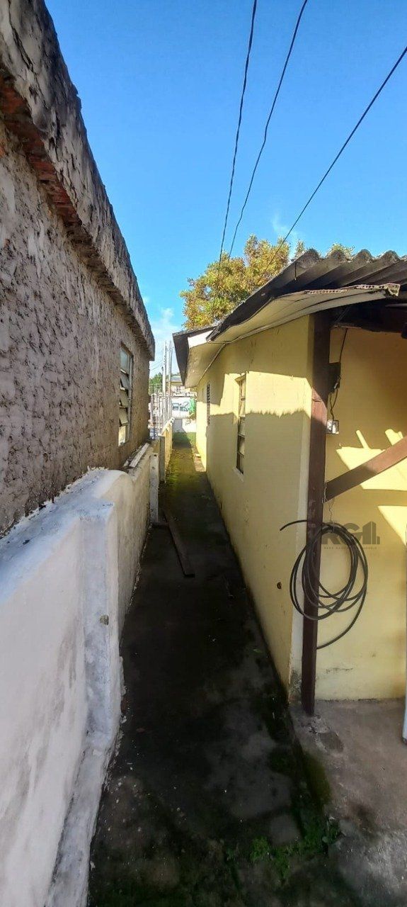 Oportunidade na zona sul, terreno com duas casas, 03 dormitórios e cozinha com churrasqueira. — foto 11