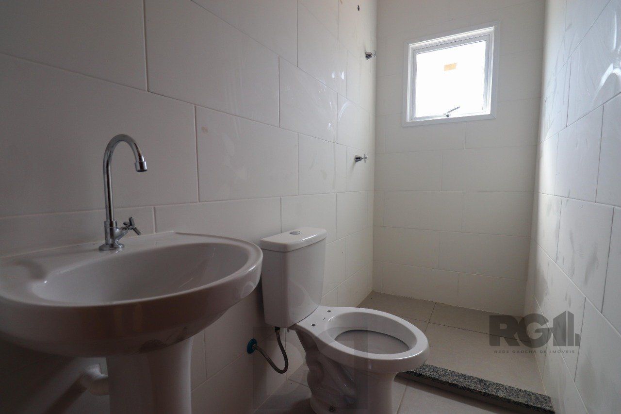 CASA ESTILO SOBRADO COM 2 QUARTOS E PÁTIO, À VENDA NO BAIRRO VILA NOVA, EM PORTO ALEGRE/RS — foto 26