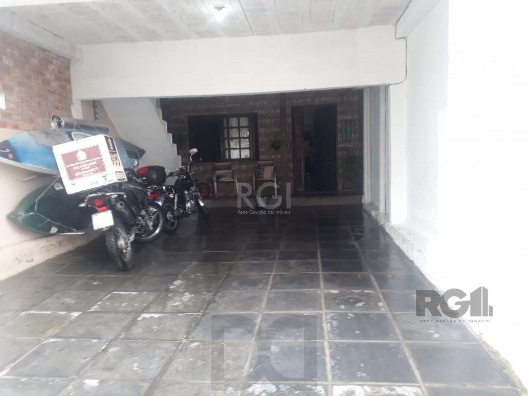 Casa com 3 dormitórios, sendo 1 suíte no bairro Hípica — foto 2