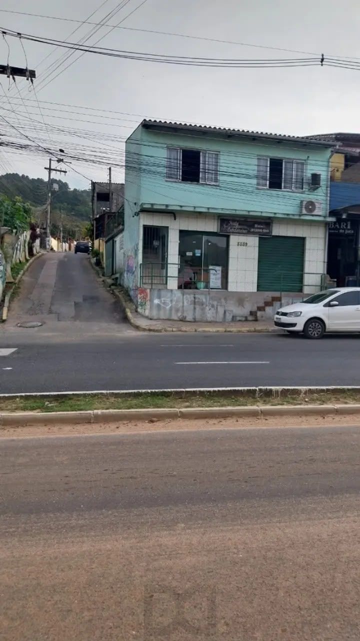 Prédio comercial/residencial com 3 dormitórios, garagem coberta no bairro Hípica — foto 1