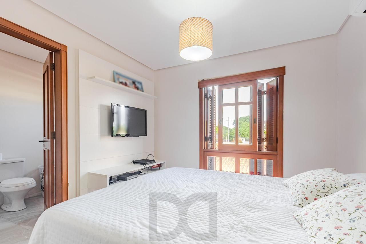 Casa em condomínio 3 dormitórios e sótão bairro Cristal — foto 18