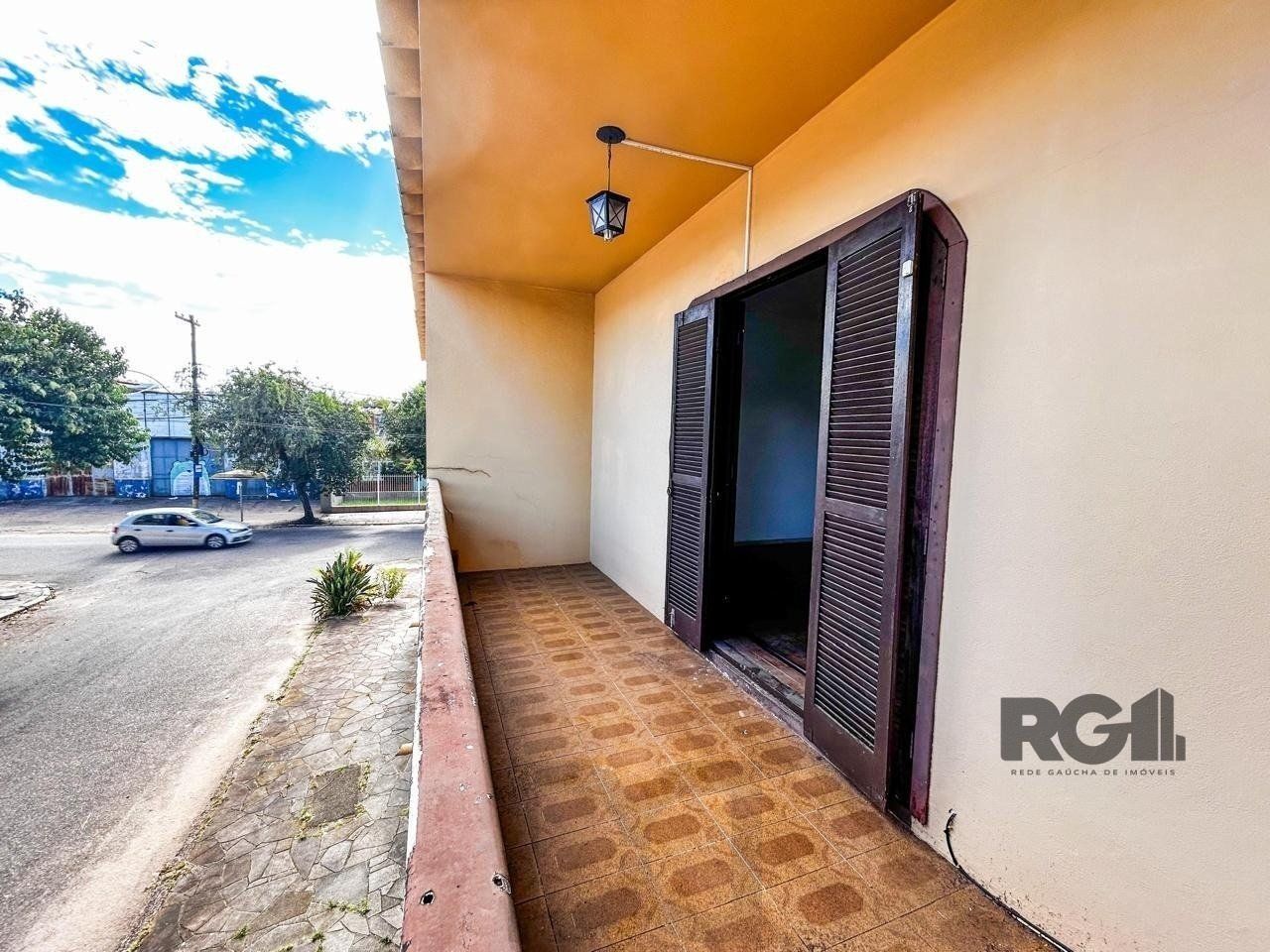 Casa com 2 salas comerciais, 3 quartos, vaga de garagem churrasqueira, suíte, no bairro Cavalhada, Porto Alegre/RS — foto 13