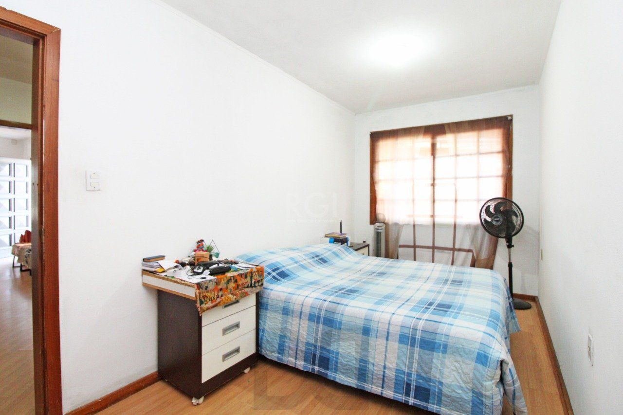 Casa 5 dormitórios, 1 suíte, 2 vagas de garagem, no bairro Camaquã, Poa/RS. — foto 18
