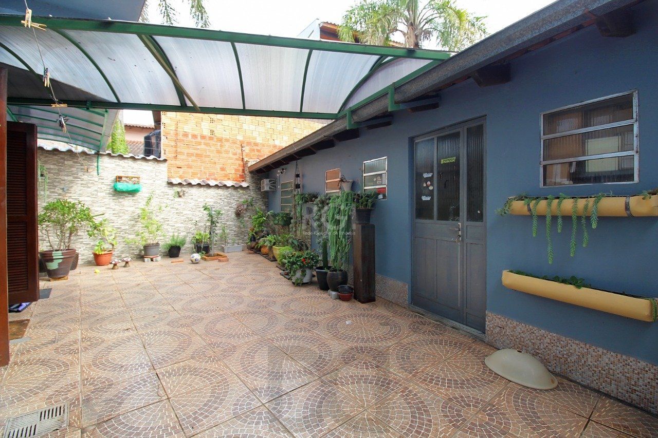 Casa para Venda - 339m², 3 dormitórios, 2 vagas - Vila Nova, Porto Alegre — foto 7