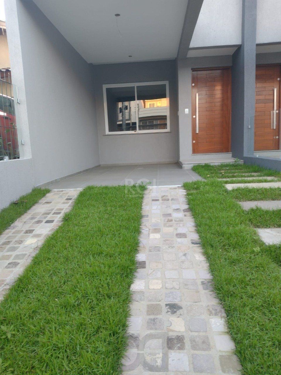 Casa 3 dormitórios, sendo 1 suites, 2 vagas - Guarujá, Porto Alegre RS — foto 12