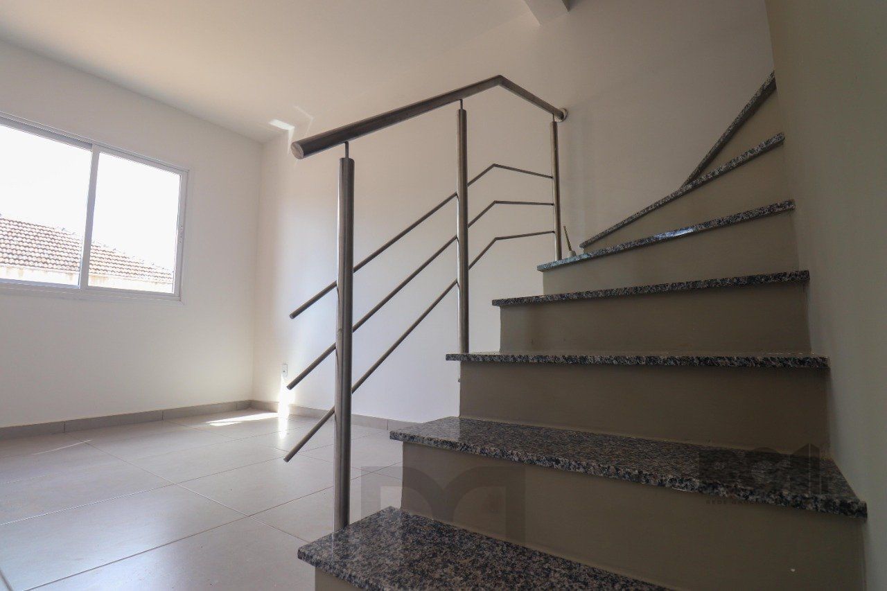 CASA ESTILO SOBRADO COM 2 QUARTOS E PÁTIO, À VENDA NO BAIRRO VILA NOVA, EM PORTO ALEGRE/RS — foto 22