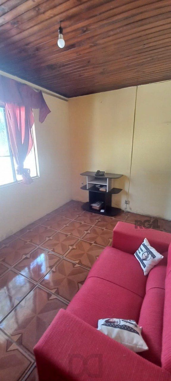 Oportunidade na zona sul, terreno com duas casas, 03 dormitórios e cozinha com churrasqueira. — foto 4