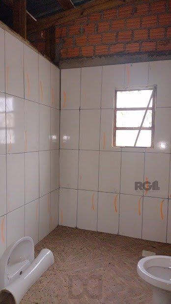 Casa de dois dormitórios localizada no Bairro Nonoai — foto 5